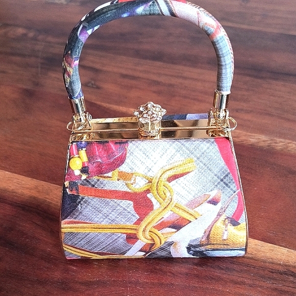 Classy Simon Chang Multicolor Handbag with Gold Accents. Great Condition. - Picture 2 of 11